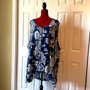 Woman within blue,green,white high low tank flower